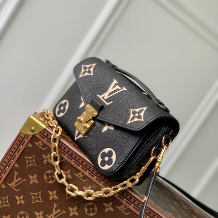 POCHETTE MÉTIS EAST WEST 21 IN BLACK AND BEIGE MONOGRAM EMPREINTE CALFSKIN EMBOSSED LOGO