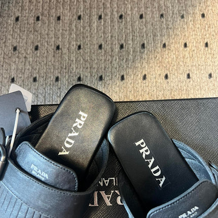 PRADA 25S SHUFFLE LEATHER THONG SANDALS IN BLACK CALFSKIN