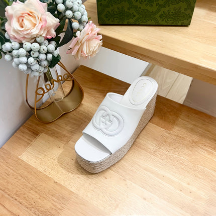 HIGH 10CM WEDGE SANDALS IN WHITE SHEEPSKIN