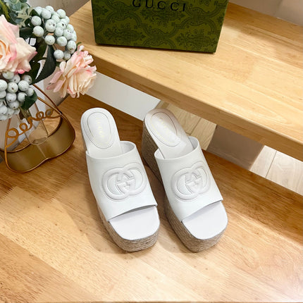 HIGH 10CM WEDGE SANDALS IN WHITE SHEEPSKIN