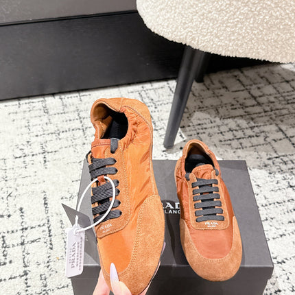 PRADA 25S COLLAPSE SNEAKERS IN BURNT ORANGE RE NYLON AND SUEDE
