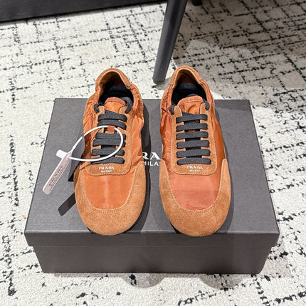 PRADA 25S COLLAPSE SNEAKERS IN BURNT ORANGE RE NYLON AND SUEDE