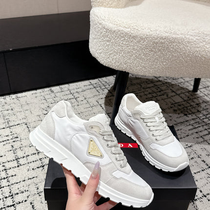 PRADA 25S MEN SNEAKERS LOGO IN WHITE NUBUCK AND CANVAS