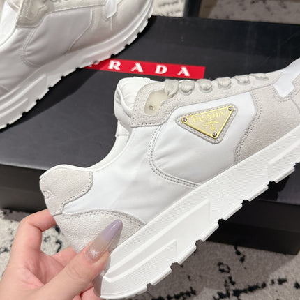 PRADA 25S MEN SNEAKERS LOGO IN WHITE NUBUCK AND CANVAS