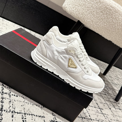 PRADA 25S MEN SNEAKERS LOGO IN WHITE NUBUCK AND CANVAS