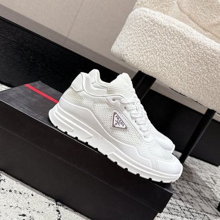 PRADA 25S MEN SNEAKERS IN WHITE CANVAS