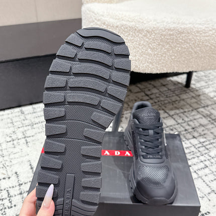 PRADA 25S MEN SNEAKERS IN BLACK CANVAS