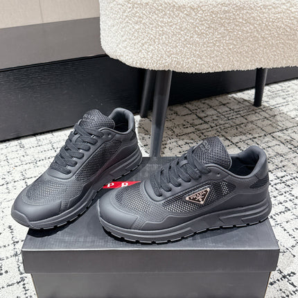 PRADA 25S MEN SNEAKERS IN BLACK CANVAS