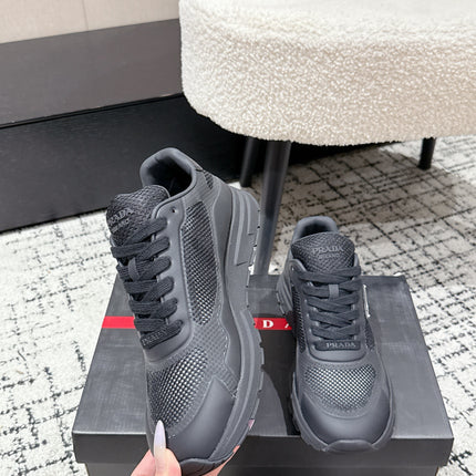 PRADA 25S MEN SNEAKERS IN BLACK CANVAS