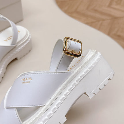 PRADA 25S CRISSCROSS SANDALS IN WHITE CALFSKIN