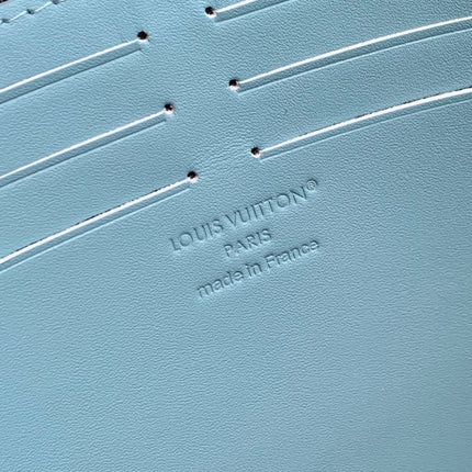 POCHETTE VOYAGE 26 IN SKY BLUE MONOGRAM ECLIPSE CALFSKIN