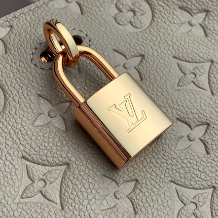 ANYTIME PM 34 IN ASH BROWN MONOGRAM EMPREINTE CALFSKIN