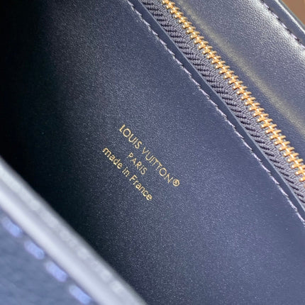 TWIST SLIM 19 IN NAVY BLUE TAURILLON CALFSKIN GOLD HARDWARE
