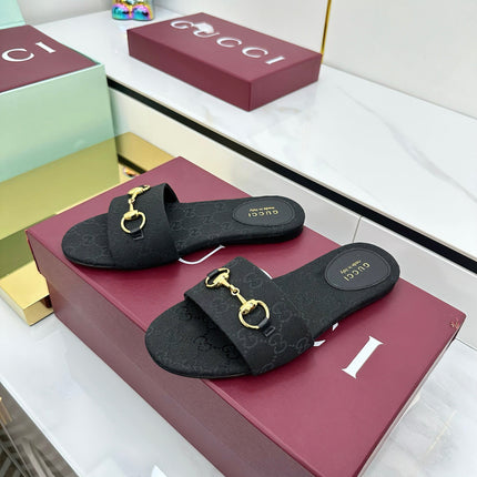 GG SLIDES IN BLACK WITH GOLD HARDWARE
