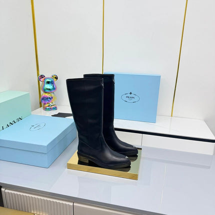 PRADA 25S POINTED TALL BOOTS 50MM IN BLACK CALFSKIN WITH LOGO