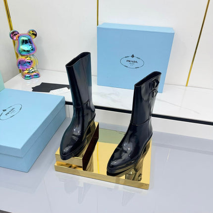 PRADA 25S BROOKLYN BOOTS 50MM IN BLACK GLOSSY CALFSKIN WITH LOGO