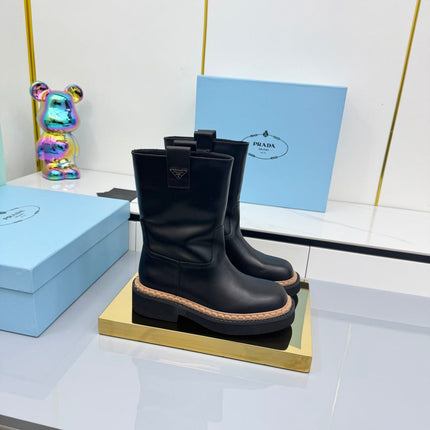 PRADA 25S HIGH MARTIN BOOTS 50MM IN BLACK CALFSKIN