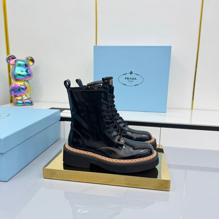 PRADA 25S LONG THICK SOLED MARTIN BOOTS 50MM IN BLACK GLOSSY CALFSKIN