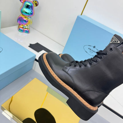 PRADA 25S LONG THICK SOLED MARTIN BOOTS 50MM IN BLACK CALFSKIN
