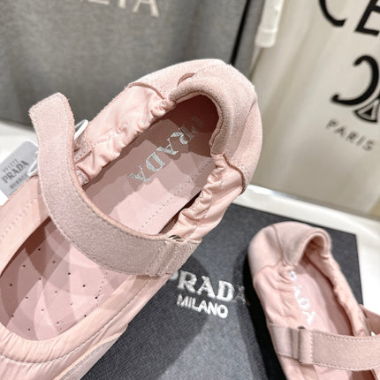 PRADA 25S COLLAPSE RE NYLON AND SUEDE BALLERINAS IN BABY PINK