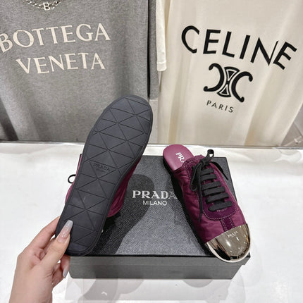 PRADA 25S MULES IN PLUM WITH METAL TOECAP