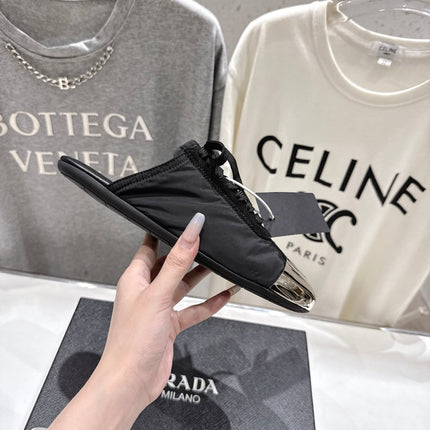 PRADA 25S MULES IN BLACK WITH METAL TOECAP