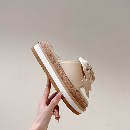 CC SLIPPERS WITH SILK BOW IN BEIGE ALMOND COWHIDE