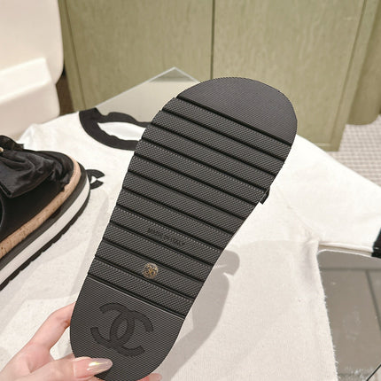 CC SLIPPERS WITH SILK BOW IN BLACK COWHIDE