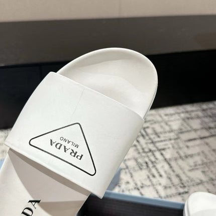 PRADA 25S RUBBER SLIDE IN WHITE CALFSKIN WITH LOGO