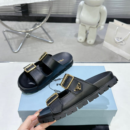PRADA 25S STRAP SLIDES 30MM IN BLACK CALFSKIN GOLD HARDWARE