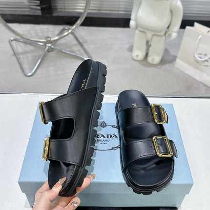 PRADA 25S STRAP SLIDES 30MM IN BLACK CALFSKIN GOLD HARDWARE