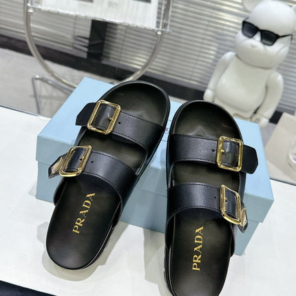 PRADA 25S STRAP SLIDES 30MM IN BLACK CALFSKIN GOLD HARDWARE
