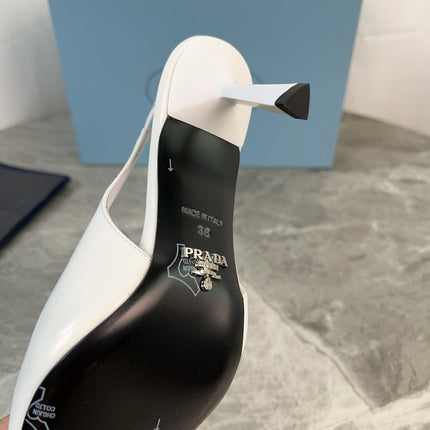 PRADA 25S METAL-TOE SLINGBACK PUMPS IN WHITE CALFSKIN