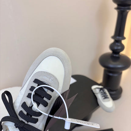 SNEAKER MULES IN BEIGE SUEDE AND WHITE NYLON