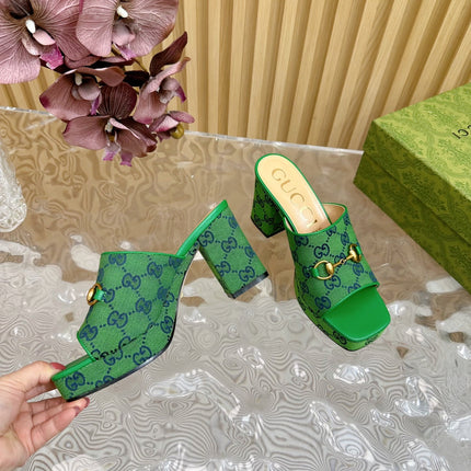 HORSEBIT SLIDE SANDAL IN FOREST GREEN MONOGRAM CANVAS AND SHEEPSKIN LINING