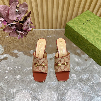 HORSEBIT SLIDE SANDAL IN BRONZE ORANGE MONOGRAM CANVAS AND SHEEPSKIN LINING