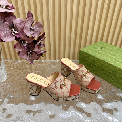 HORSEBIT SLIDE SANDAL IN BRONZE ORANGE MONOGRAM CANVAS AND SHEEPSKIN LINING