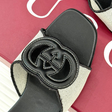 SLIDE SANDALS IN BLACK AND WHITE CALFSKIN