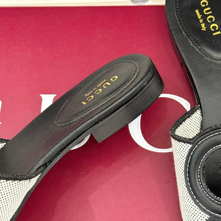 SLIDE SANDALS IN BLACK AND WHITE CALFSKIN