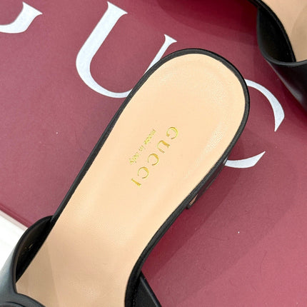 MID-HEEL MULE IN BLACK CALFSKIN