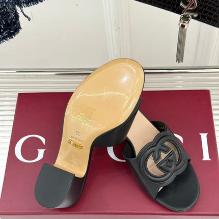 MID-HEEL MULE IN BLACK CALFSKIN