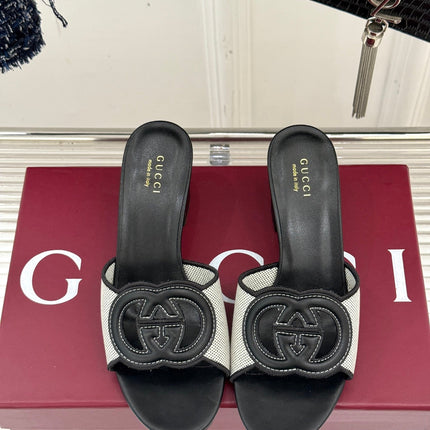 MID-HEEL MULE IN BLACK CALFSKIN AND CREAM WHITE FABRIC