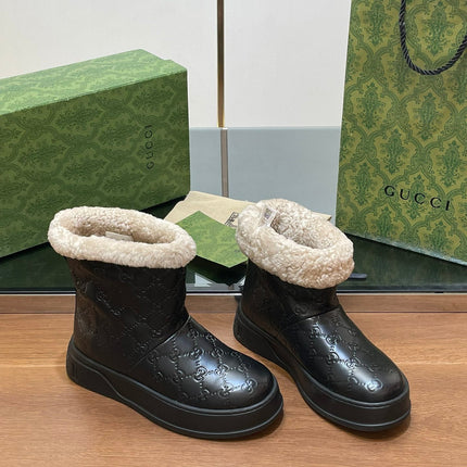 GG SNOW BOOTS IN BLACK EMBOSSED DEERSKIN AND BEIGE WOOL LINING