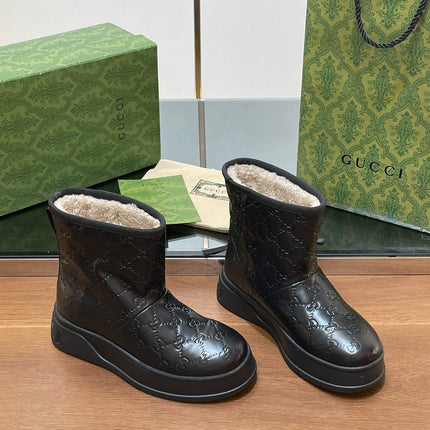 GG UGG BOOTS IN BLACK EMBOSSED SUEDE AND BEIGE WOOL LINING