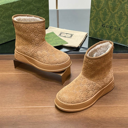 GG UGG BOOTS IN CIDER BROWN EMBOSSED SUEDE AND BEIGE WOOL LINING