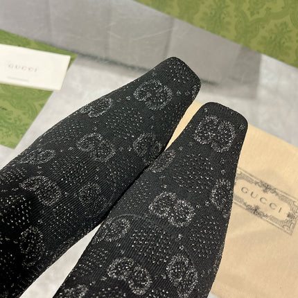 THIGH HIGH BOOTS IN BLACK KNITTED FABRIC