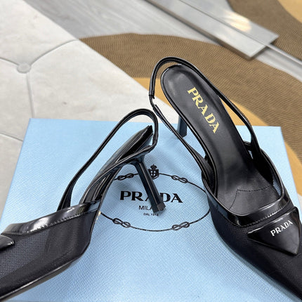 PRADA 25S TRIANGLE LOGO SLINGBACK PUMPS IN BLACK MESH FABRIC