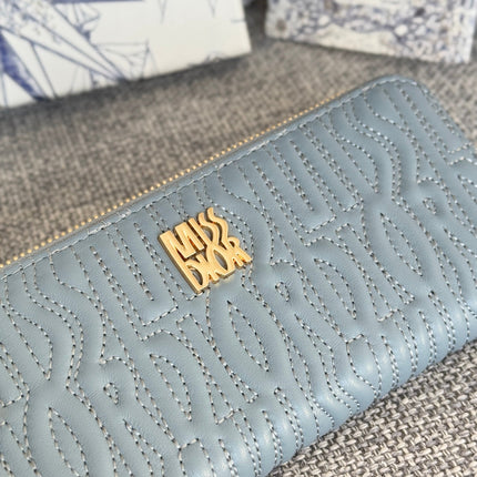 VERTICAL LONG ZIP WALLET 20 IN BABY BLUE QUILTED ALLOVER CALFSKIN