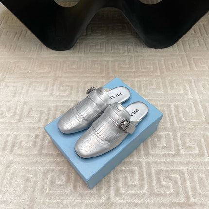 TASSEL MULES IN SILVER METALLIC LAMBSKIN