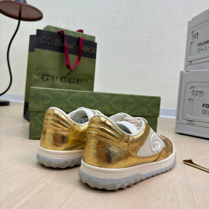 GG INTERLOCKING G SNEAKER GOLD CALFSKIN AND FABRIC